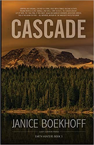 book cover for Cascade by Janice Boekhoff - eerie photo of a snow covered mountain in front of an evergreen forest